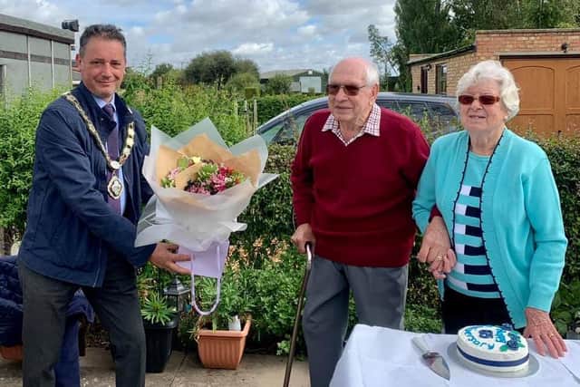 Rushden mayor Cesare Marinaro congratulating Patrick and Ann Savage on their 65th wedding anniversary