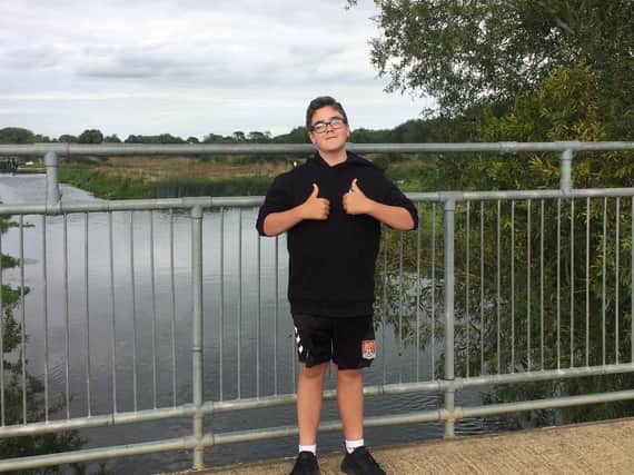 Alfie Brown, 13, from Higham Ferrers, walked a million steps for Childline