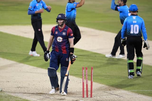 Alex Wakely trudges off after being bowled by Worcestershire's Brett D'Oliveira