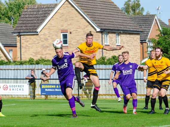 Charlie Wise headed home Corby Town’s first goal of the season but the Steelmen were pegged back by Mildenhall Town before losing on penalties in the Emirates FA Cup. Pictures by Jim Darrah