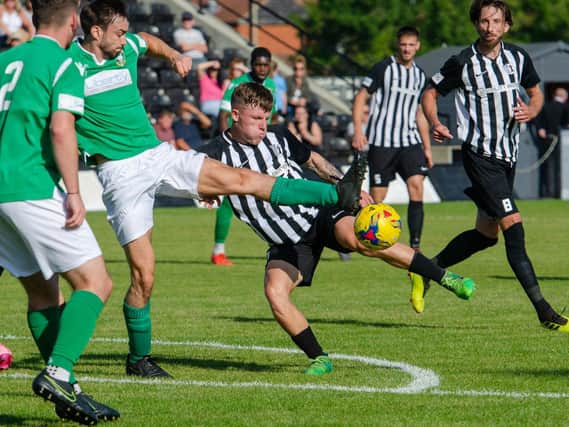 Jordon Crawford tries to get a shot on goal during Corby Town's 1-0 defeat to Aylesbury United on the opening day of the league season. Pictures by Jim Darrah