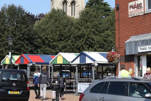 The public toilets are in the Market Square