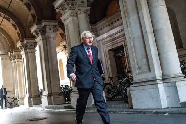 Boris Johnson on his way back to Downing Street after a cabinet meeting on Tuesday morning. Photo: Getty Images