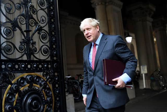 Boris Johnson on his way to deliver his stark message to the Commons today. Photo: Getty Images.