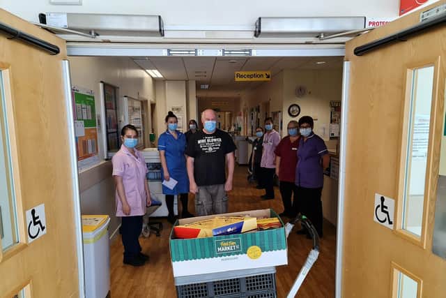 Charles Smith with the team on KGH's Geddington Ward
