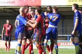 Tempers flare during Kettering Town's 1-0 friendly win at King's Lynn Town last weekend. Picture by Tim Smith