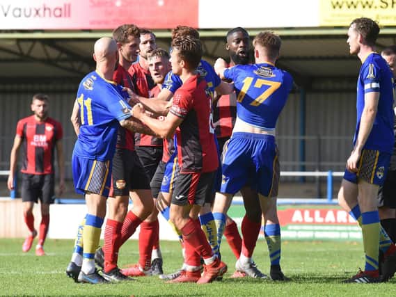 Tempers flare during Kettering Town's 1-0 friendly win at King's Lynn Town last weekend. Picture by Tim Smith