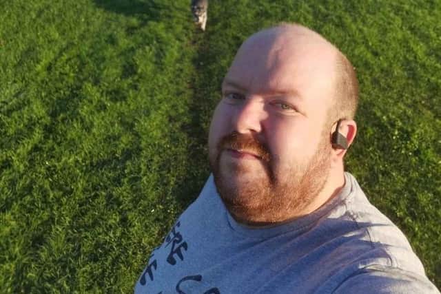 Alan likes walking the family dog, Mindy