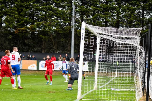 Matty Slinn's shot finds the net as his effort earned AFC Rushden & Diamonds a share of the points in a 1-1 draw with Barwell. Pictures courtesy of HawkinsImages