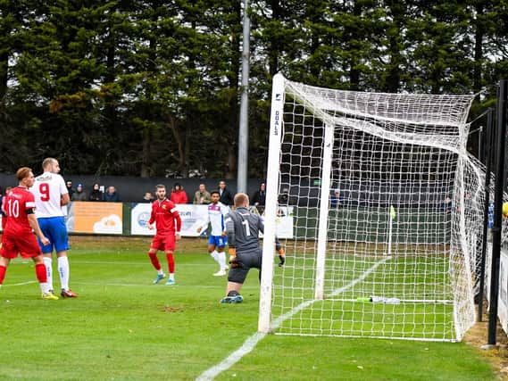 Matty Slinn's shot finds the net as his effort earned AFC Rushden & Diamonds a share of the points in a 1-1 draw with Barwell. Pictures courtesy of HawkinsImages