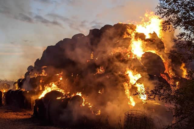 Firefighters battled a blaze involving 1,200 tonnes of hay near Hannington on Sunday. Photos: Northamptonshire Fire & Rescue