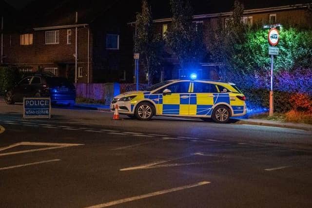 Police at the scene last night. Picture by J.C.M Photography