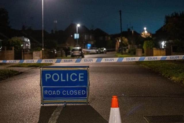 Police cordoned off areas of Burton Latimer last night after the incident. Photo: JCM
