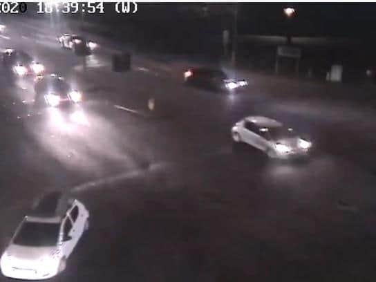 Traffic cameras spot the black car turning left onto St Andrew's Road