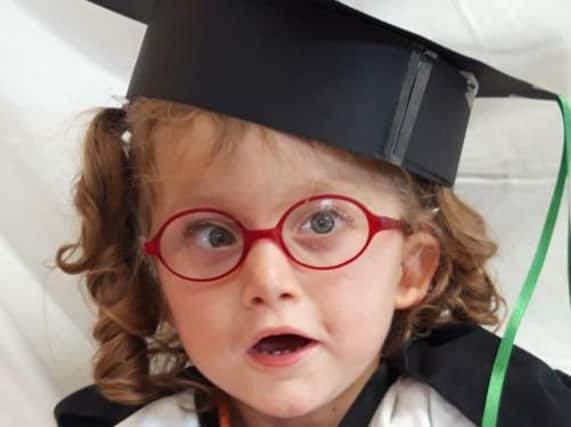 Abi won for her work with Hetty, who has a rare chromosome disorder. This is Hetty on her nursery graduation day.