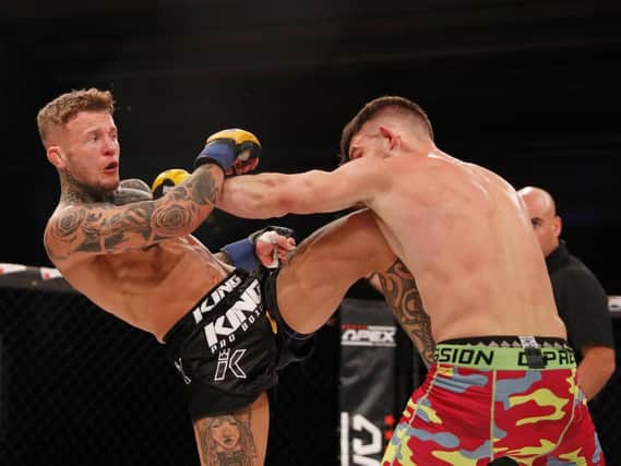 Jordan Vucenic in action during his victory over Steve Aimable. Picture by Dolly Clew, Cage Warriors