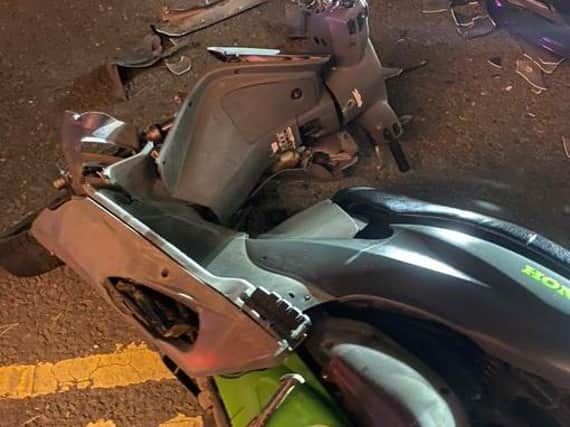 The scooter collided with an unmarked police car in Walter Tull way