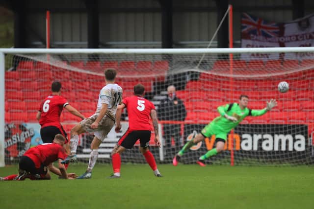 Adam Collin's fine late save preserved a clean sheet for Kettering