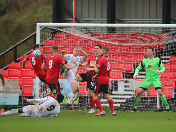 Goalmouth action from Kettering Town's 2-0 victory over Chelmsford City. Picture by Peter Short
