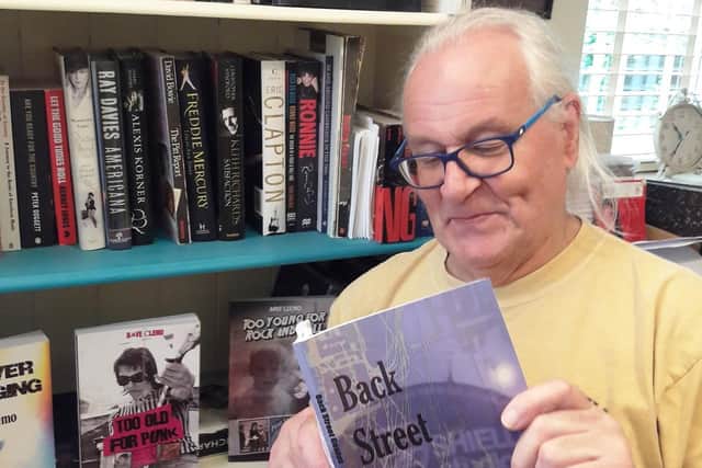 Roger with the book Back Street Genius