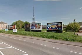 The proposed site currently has several billboards on it