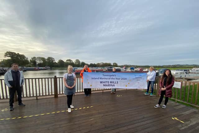 Members of the White Mills Marina team
