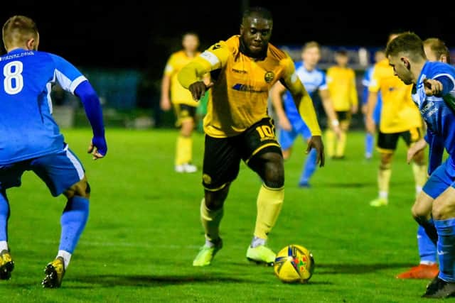 Chris Wreh runs at the Leiston defence during AFC Rushden & Diamonds' 2-2 draw on Tuesday night. Pictures courtesy of Hawkins Images Photography