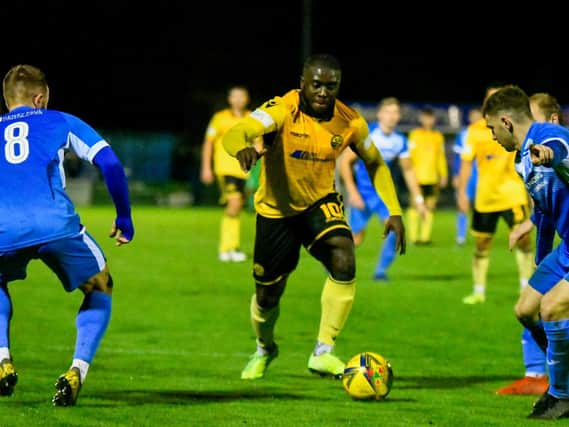 Chris Wreh runs at the Leiston defence during AFC Rushden & Diamonds' 2-2 draw on Tuesday night. Pictures courtesy of Hawkins Images Photography