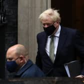 Boris Johnson leaving Downing Street to address the commons today (October 12).