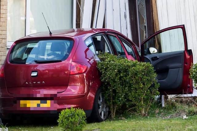 Sleszycki's car demolished the porch of a house in Lake View in April