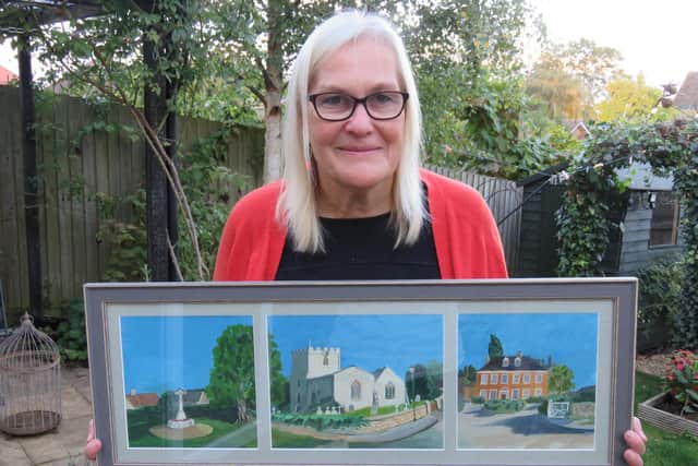 Artist Rosie Jarvis with her painting of St Botolph's Church. She is gifting it to the church to mark its 900th anniversary
