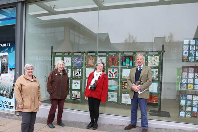 Corby Community Arts team: l-r Susan Dunn, Kate Dyer, Lola Dziarkowska with High Sheriff Paul Parsons
