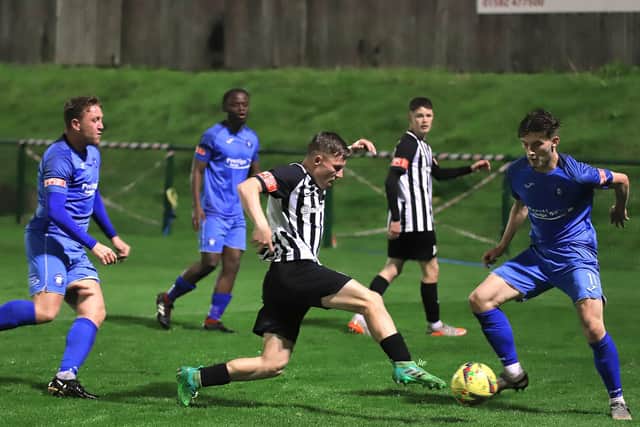 Jordon Crawford in action for Corby Town during their midweek defeat at AFC Dunstable. Pictures by Peter Short