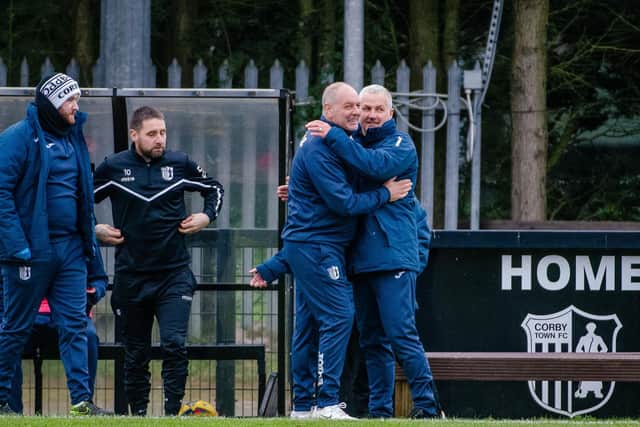 Boss Gary Mills and assistant Darron Gee enjoy that winning feeling at the final whistle