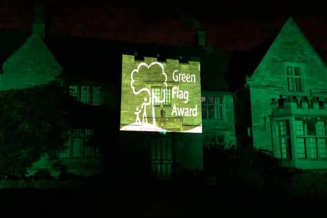 Green Flag Award is projected on to Rushden Hall