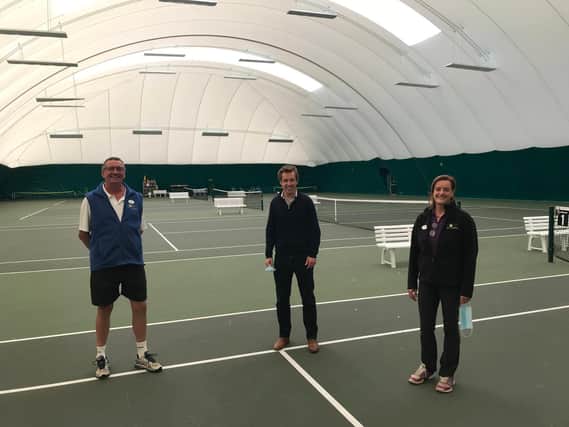 Corby Tennis Club directors Craig and Juliette Haworth with Tom Pursglove MP (middle) at the town's community indoor tennis centre.