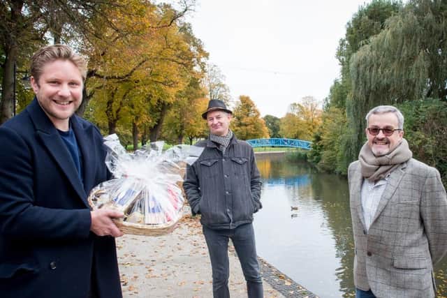 Gregg Cave and Nick Ellison (left and middle) collecting their prize from John Griff (picture credit Megan Lord/Nenescape)