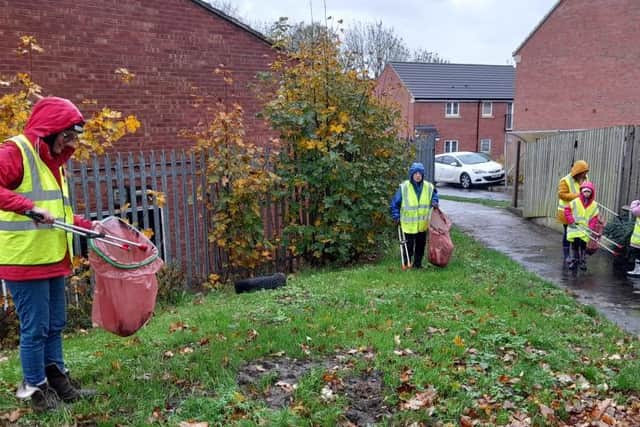Volunteers braving the rain for the litter pick