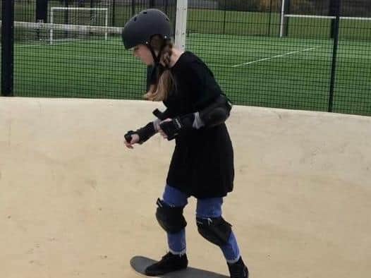 Annabelle on her skateboard