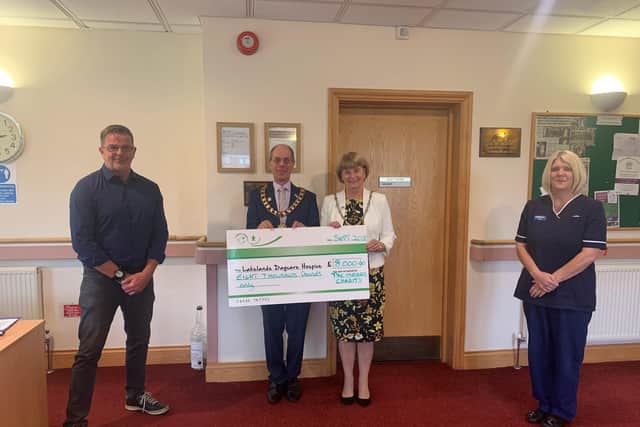 Cllr Beeby, with Consort and wife, Mrs Toni Beeby, presenting staff at Lakelands Hospice with cheque for £8,000.

 

Subject:           Cllr Beeby raises £8,000 for chosen charity


 

Cllr Ray Beeby, former Mayor of Corby for the year 2019/2020 proudly handed over a cheque to Lakelands Hospice following a successful year raising money for his local chosen charity.

 

Despite having events in the pipeline which sadly had to be cancelled due to the global Covid-19 pandemic, Cllr Beeby still managed to raise a huge £8,000 for Lakelands following an array of different events including Dances, Raffles, Dress Down Days for staff at Corby Borough Council, a Fashion Show, Walking Football events and a Civic Ball.

 

Former Mayor, Cllr Ray Beeby, said:

 

“What a year! I’d like to say a huge thank you to everyone who has helped along the way towards such an amazing final total. Whether you have helped to organise, attended, bought raffle tickets or shown support in any other way. This wouldn’t have been possible w