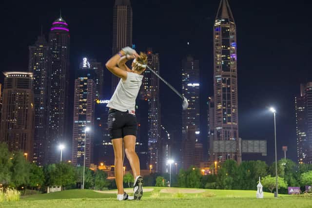 This incredible image shows Wellingborough's Meghan MacLaren in action during the Omega Dubai Moonlight Classic at Emirates GC. Picture courtesy of Ladies European Tour (LET)