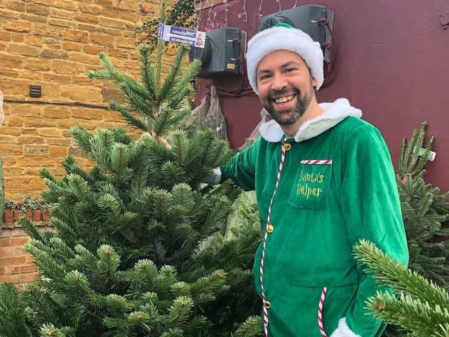 The Tree Buddy founder Andy Cohen dresses up as an elf when he delivers the trees