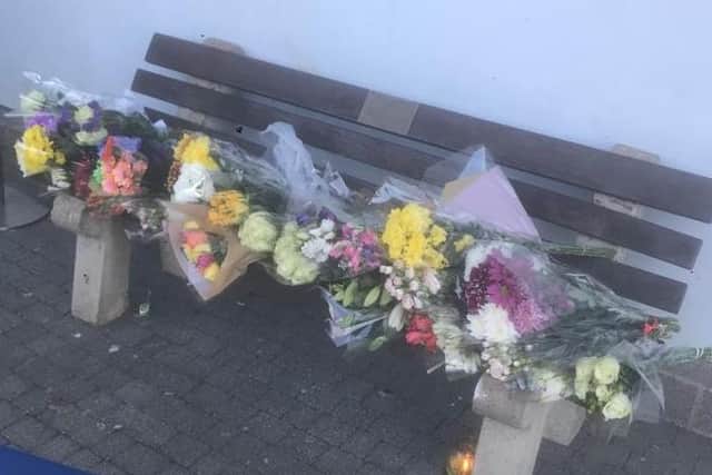 Floral tributes from school pupils at Kingswood for their fellow-student Mikey