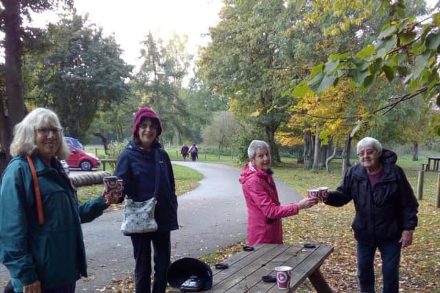 Members of Irchester WI enjoying a socially distanced hot drink after their sponsored walk.