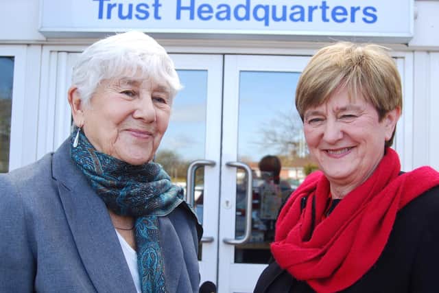 Healthwatch Northamptonshire volunteers Sheila White and Wendy Patel outside Kettering General Hospital Trust Headquarters
