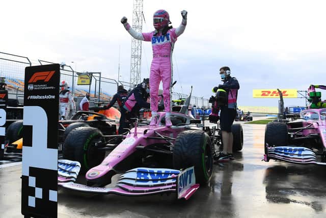 Lance Stroll celebrates his pole position