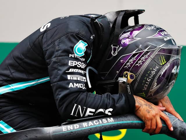 An emotional Lewis Hamilton celebrates his championship win