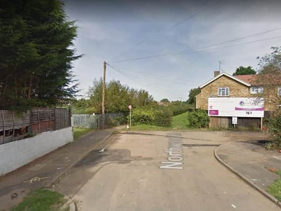 Northamptonshire Police are appealing for witnesses after a woman was attacked by a dog in the alleyway on Northwood Road in Northampton.