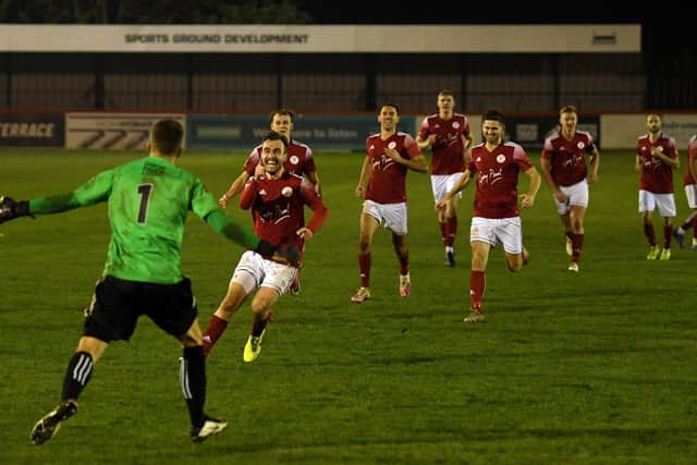 Brackley Town progressed into the second round of the FA Cup after a penalty shoot-out success over Bishop's Stortford at St James Park