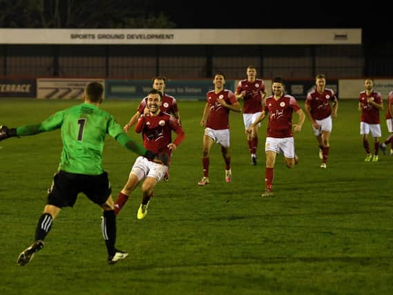 Brackley Town progressed into the second round of the FA Cup after a penalty shoot-out success over Bishop's Stortford at St James Park